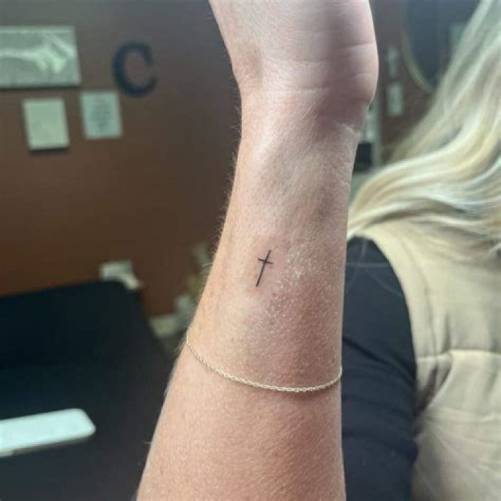Small Cross on Wrist Tattoo: A Meaningful Expression of Faith and Style